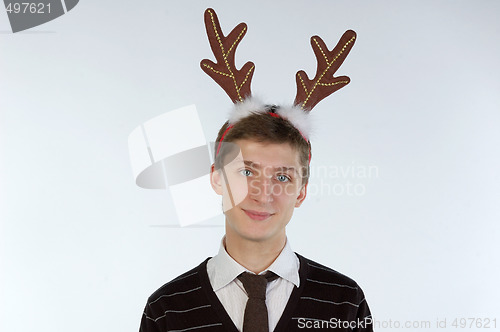 Image of Young man wearing deer horns