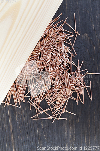 Image of red copper nails