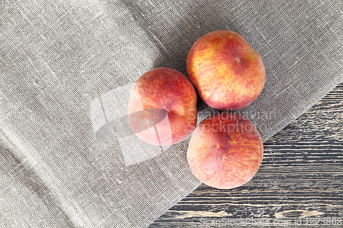 Image of three peaches