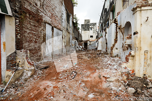 Image of Street with ruins of demolished houses. Chennai, India