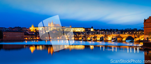 Image of View of Charles Bridge Karluv most and Prague Castle Prazsky hrad in twilight. Panorama