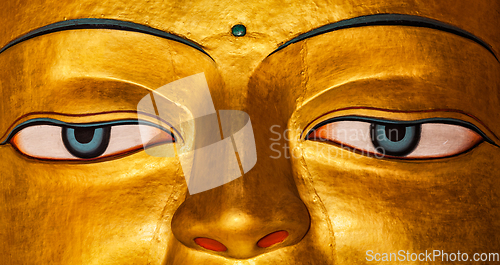 Image of Sakyamuni Buddha statue face close up