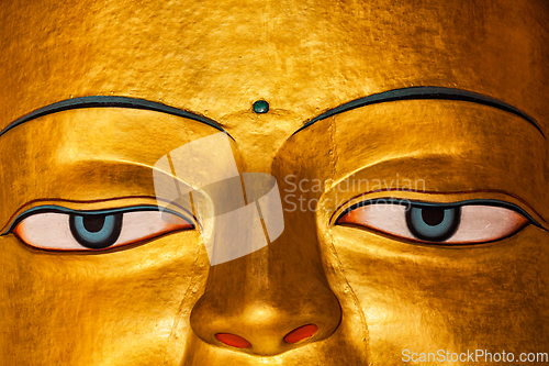 Image of Sakyamuni Buddha statue face close up