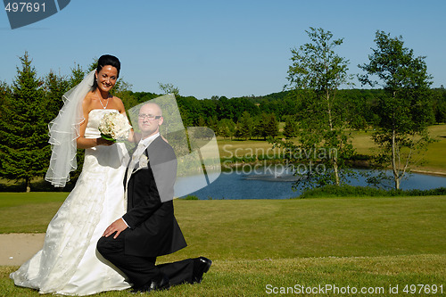 Image of Wedding - Groom on knee