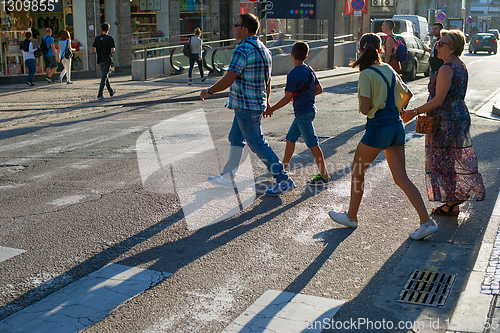 Image of People crossing road Porto Portugal