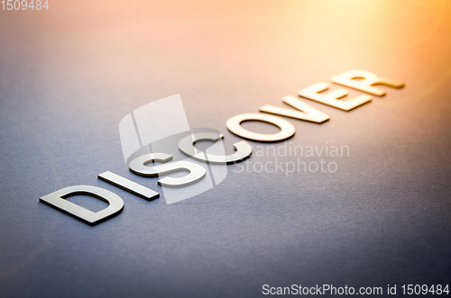 Image of Word discover written with white solid letters