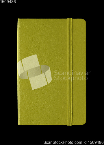 Image of Olive green closed notebook isolated on black