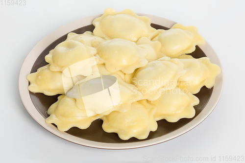 Image of Vareniki or dumplings, pierogi before boiling - traditional Ukrainian food