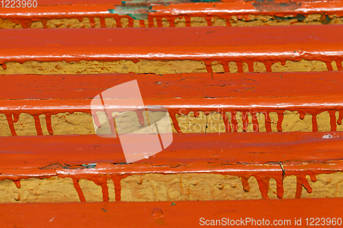 Image of red wooden bench