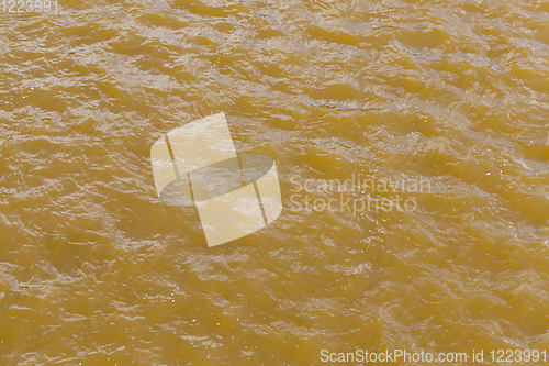 Image of yellow dirty river