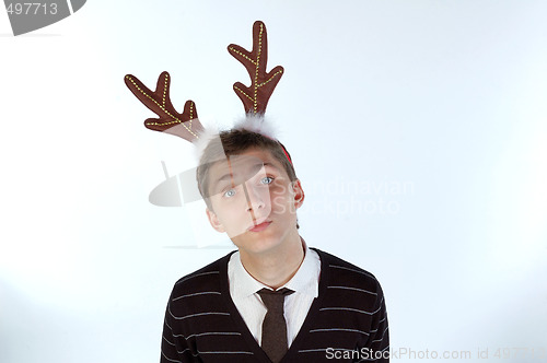 Image of Young man wearing deer horns