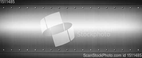 Image of Steel riveted brushed plate. Banner background texture.