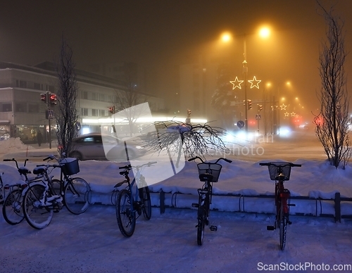 Image of night landscape in a small finnish town with christmas lights