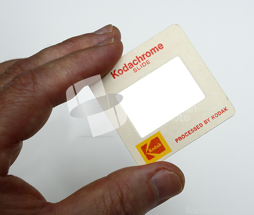 Image of slide kodachrome with inscription processed by kodak in hand 