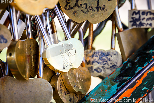 Image of Love Paris Padlocks hanging on a fence