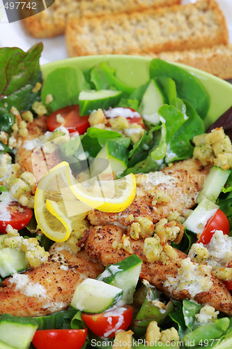 Image of Green salad with chicken stripes