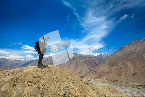 Image of Photographer taking photos in Himalayas