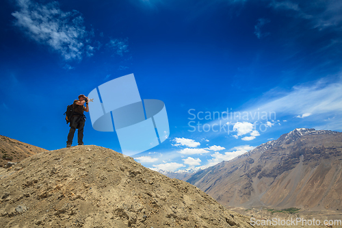 Image of Photographer taking photos in Himalayas