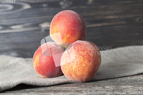 Image of three peaches