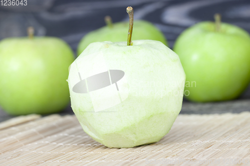 Image of peeled green ripe apple