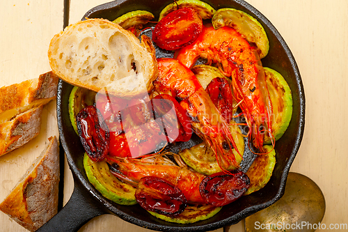 Image of roasted shrimps with zucchini and tomatoes