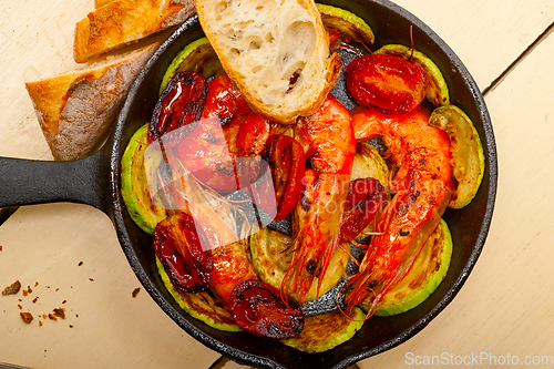 Image of roasted shrimps with zucchini and tomatoes