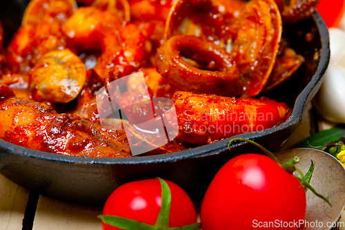 Image of fresh seafoos stew on an iron skillet