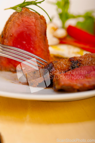 Image of beef filet mignon grilled with vegetables