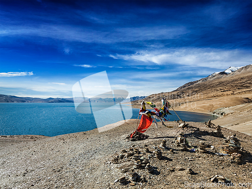 Image of Buddhist prayer flags lungta at Himalayan lake