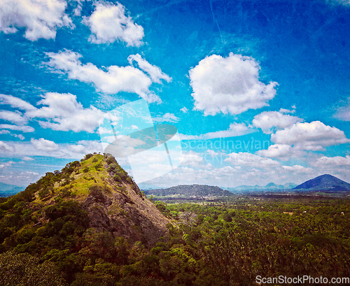 Image of Sky above small mountains