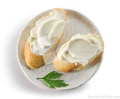 Image of baguette slices with cream cheese 