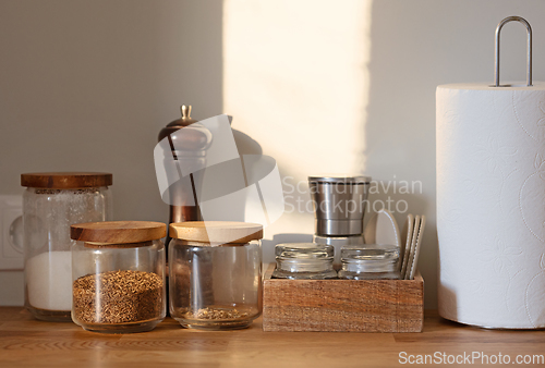 Image of various containers on kitchen table