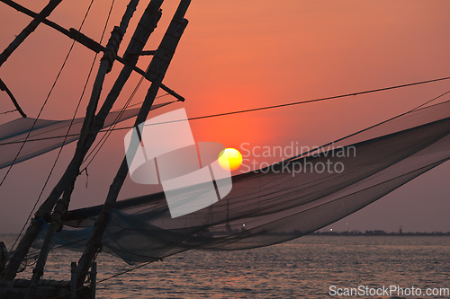 Image of Chinese fishnets on sunset. Kochi, Kerala, India