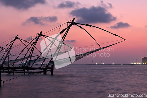 Image of Chinese fishnets on sunset. Kochi, Kerala, India