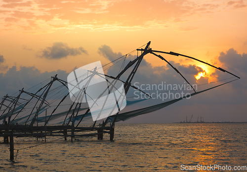 Image of Chinese fishnets on sunset. Kochi, Kerala, India