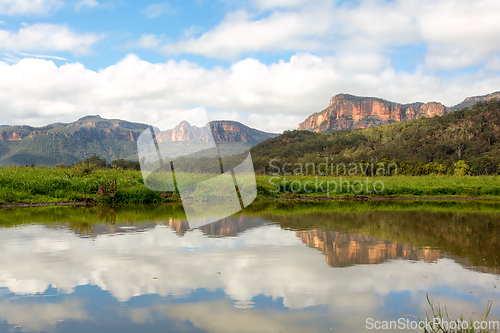 Image of Steep cliffs of the Capertee canyon reflecting in water