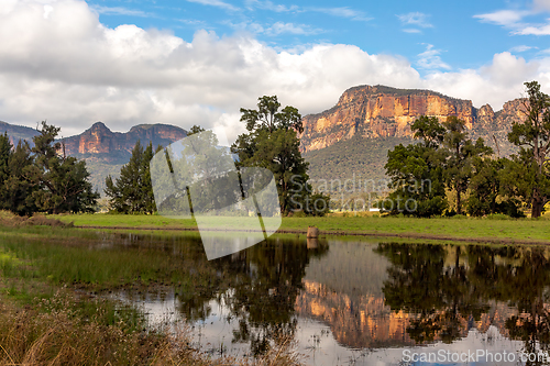 Image of Scenic sandstone cliffs rise from the Capertee Valley