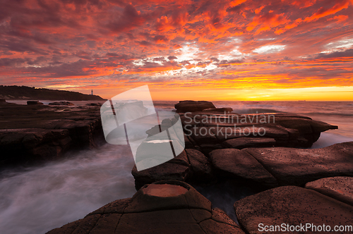 Image of Fiery red autumn sky at Soldiers Point Australia