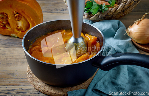 Image of process of mixing stewed vegetables