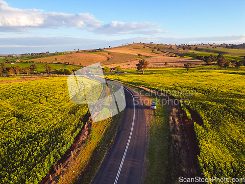 Image of Beautiful morning sunlight on country fields and hills