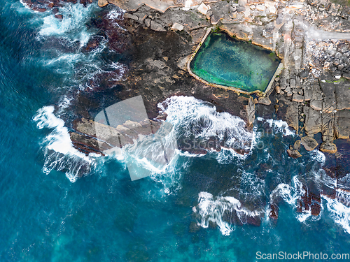 Image of Incredible tidal pool built into the rocky cliffs of the coastli