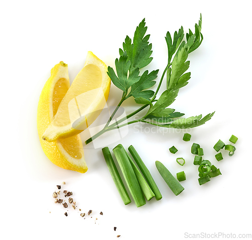 Image of cut of lemon and parsley