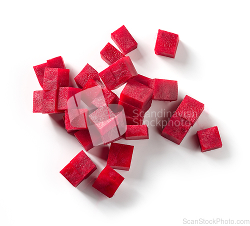 Image of beetroot cubes on white background
