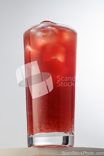 Image of glass of red iced drink