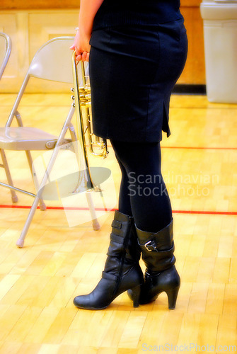 Image of Sexy female trumpet player.