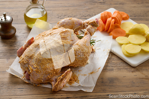 Image of chicken with spicy butter and vegetables