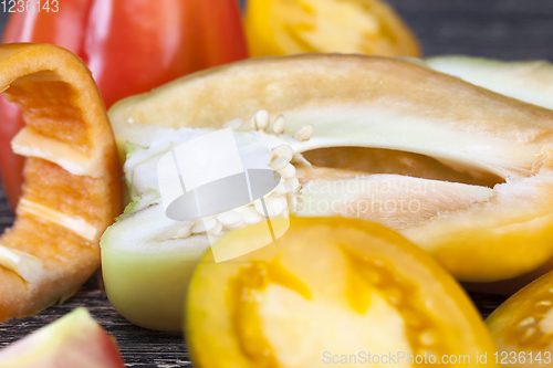 Image of half-sliced peppers