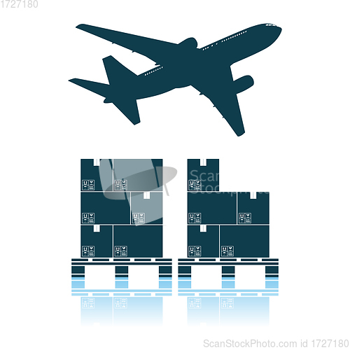 Image of Boxes On Pallet Under Airplane