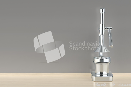 Image of Silver citrus juicer in the kitchen
