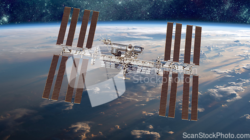 Image of International Space Station over the planet earth. Elements of t